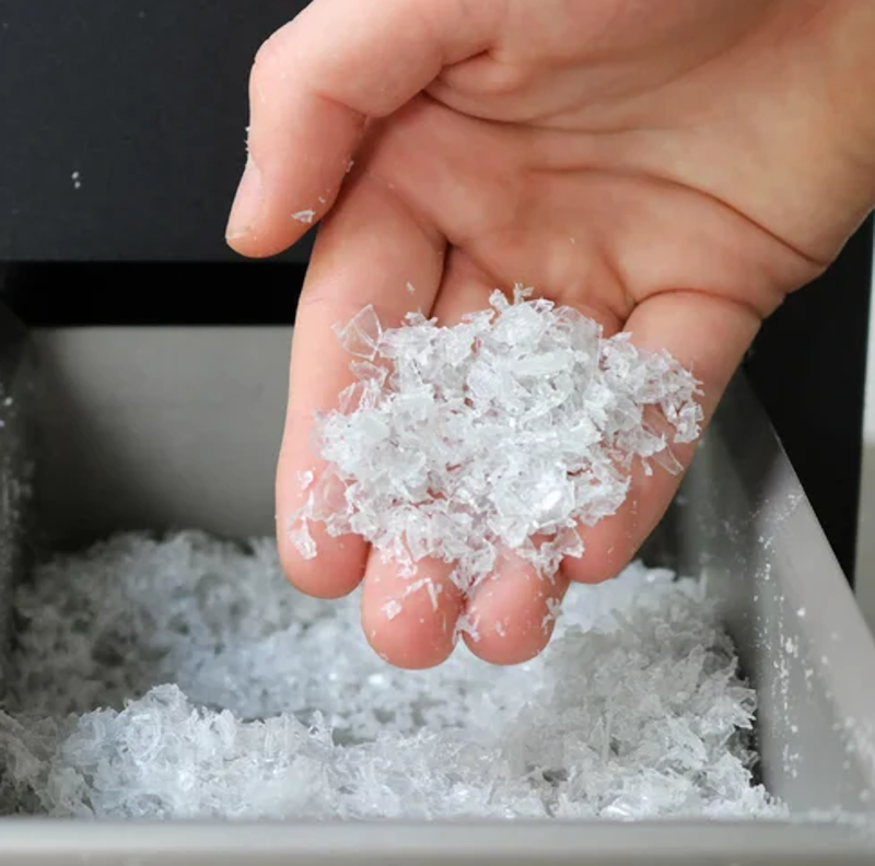 Material processed in the shredder, ready to be melted and extruded.