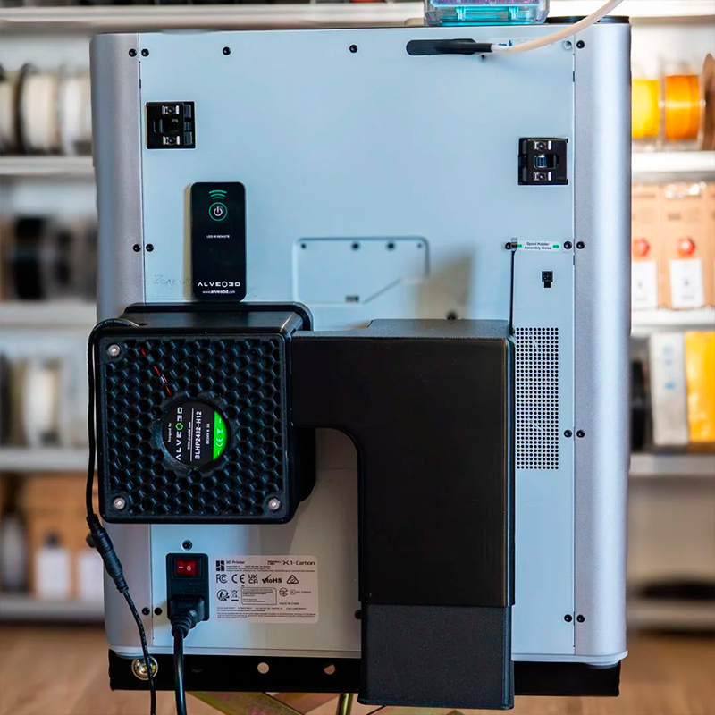 Versão V2 instalada numa impressora Bambu Lab.