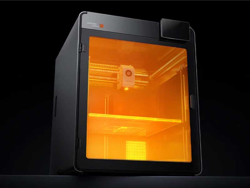 The Kobra S1 Max Combo 3D printer features a closed, heated chamber that reaches up to 65°C.