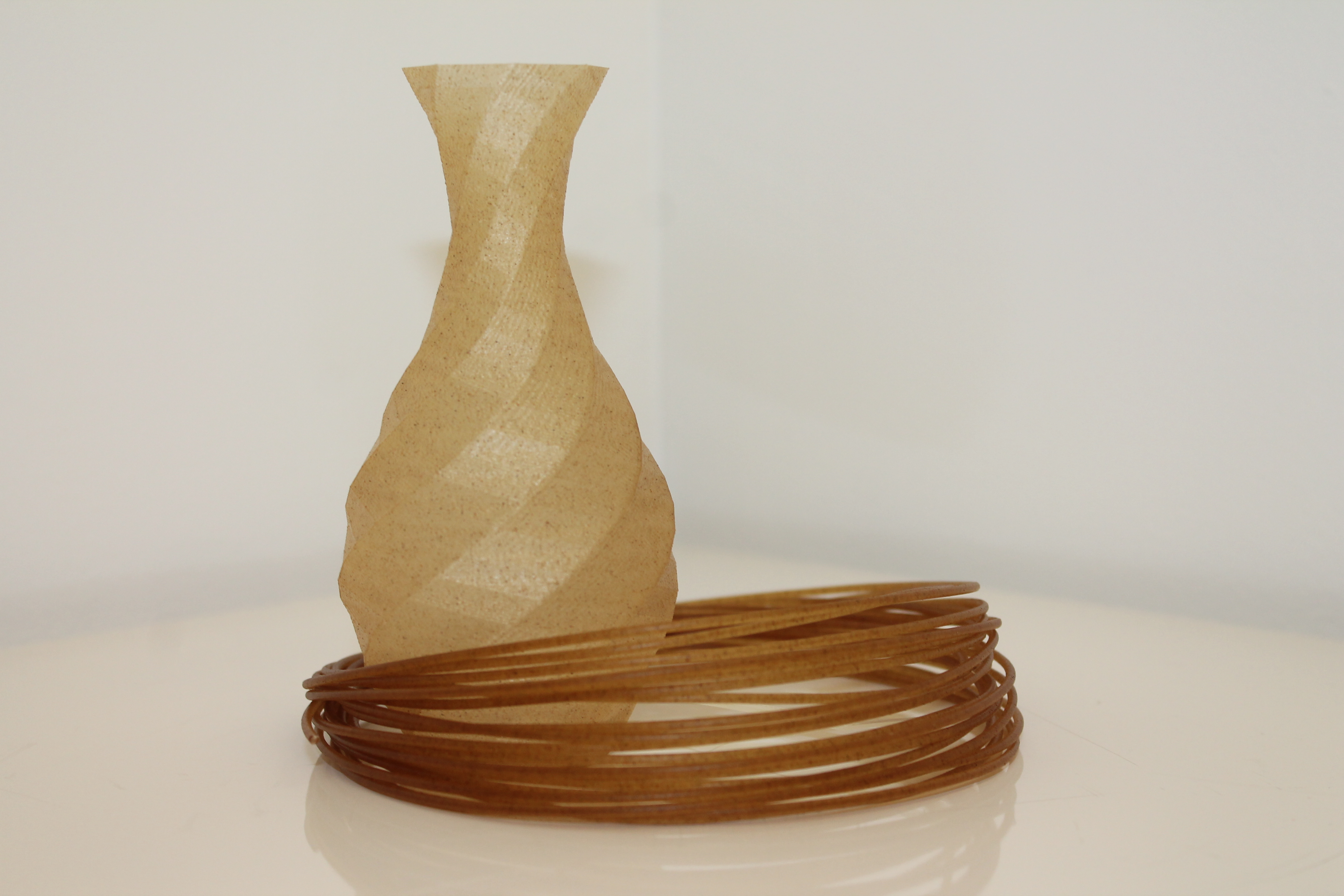 Filament and part printed with PLA Wheat.