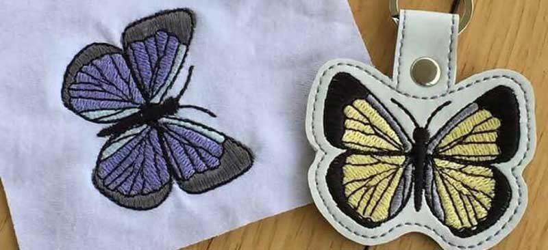Patches und Schlüsselanhänger erstellt mit der PooLin EOC06 Stickmaschine.