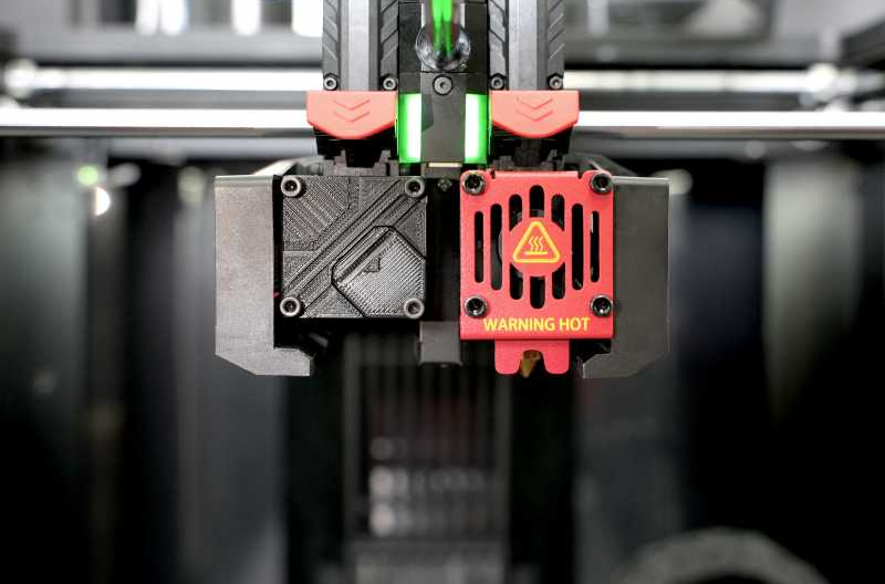 The Auto Calibrator inserted next to the Hyper Speed hotend for calibration